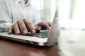 Close up of business man hand working on laptop computer Royalty Free Stock Photo