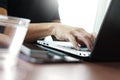 Close up of business man hand working on laptop computer Royalty Free Stock Photo