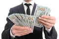 Close up of a business man hands counting banknotes