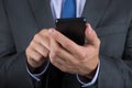 Close up of business man hands holding mobile phone Royalty Free Stock Photo