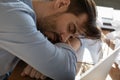 Close up view tired businessman sleeping at workplace Royalty Free Stock Photo