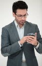 Close up. business man reading an SMS on his smartphone Royalty Free Stock Photo