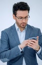 Close up. business man reading an SMS on his smartphone Royalty Free Stock Photo