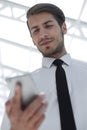 Close up.business man reading an SMS on the smartphone Royalty Free Stock Photo