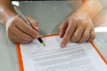 Close up of business man signing contract making a deal. Royalty Free Stock Photo