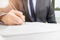 Close up business man signing documents or contract Royalty Free Stock Photo