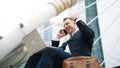 Close up of business man talking phone and celebrate successful project. Urbane. Royalty Free Stock Photo