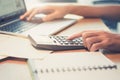 Close up Business man using calculator and laptop computer for c Royalty Free Stock Photo