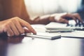 Close up business man using smartphone in the office with sunlig Royalty Free Stock Photo