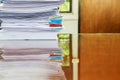 Close up of business papers stack on desk. Pile of unfinished documents on office desk Royalty Free Stock Photo