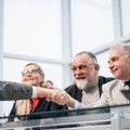 Close up. business partners confirming the deal with a handshake Royalty Free Stock Photo