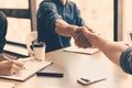 close up. business partners confirming the transaction with a handshake. Royalty Free Stock Photo