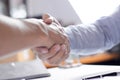 Close-up  of business partners shaking hands and.hand business men and women who shaking hands Royalty Free Stock Photo