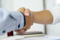 Close-up  of business partners shaking hands and.hand business men and women who shaking hands Royalty Free Stock Photo