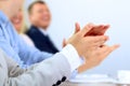 Close-up of business people clapping hands. Business seminar concept Royalty Free Stock Photo