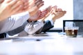 Close-up of business people clapping hands. Business seminar concept Royalty Free Stock Photo