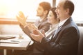 Close-up of business people clapping hands. Business seminar concept in office Royalty Free Stock Photo