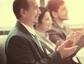 Close-up of business people clapping hands. Business seminar concept in office Royalty Free Stock Photo