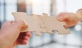 close up of business people connecting couple puzzle jigsaw, business solution concept. Royalty Free Stock Photo