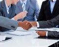 Close-up of business people greeting each other Royalty Free Stock Photo