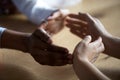 Close up business people join hands forming circle, show unity Royalty Free Stock Photo