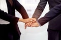 Close up of business people putting their hands together Royalty Free Stock Photo