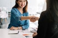 Close up of Business people shaking hands, finishing up meeting, business etiquette, congratulation, merger and Royalty Free Stock Photo