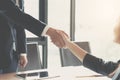 Close up of Business people shaking hands, finishing up meeting, business etiquette, congratulation, merger and acquisition