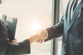 Close up of Business people shaking hands, finishing up meeting, business etiquette, congratulation, merger and acquisition Royalty Free Stock Photo