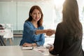 Close up of Business people shaking hands, finishing up meeting, business etiquette, congratulation, merger and Royalty Free Stock Photo