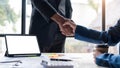 Close up of Business people shaking hands, finishing up meeting, business etiquette, congratulation, merger and Royalty Free Stock Photo