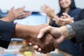 Close up. Business people shaking hands during a meeting in office Royalty Free Stock Photo