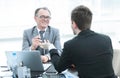 Close up.business people talking at a Desk. Royalty Free Stock Photo