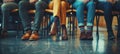 Close up of business peoples legs waiting for a job interview. Hiring and recruitment concept