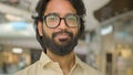 Close up business portrait headshot happy Arabian Hispanic Indian Muslim man agent worker businessman guy in glasses