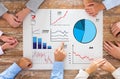 Close up of business team with charts at table Royalty Free Stock Photo