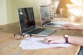 Close up of business woman hand working on laptop computer with Royalty Free Stock Photo