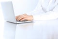 Close-up of business woman hands typing on laptop computer. Secretary at work in office Royalty Free Stock Photo