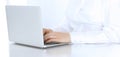 Close-up of business woman hands typing on laptop computer. Secretary at work in office Royalty Free Stock Photo