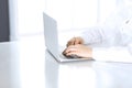 Close-up of business woman hands typing on laptop computer. Secretary at work in office Royalty Free Stock Photo