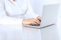 Close-up of business woman hands typing on laptop computer. Secretary at work in office Royalty Free Stock Photo