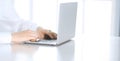 Close-up of business woman hands typing on laptop computer. Secretary at work in office Royalty Free Stock Photo