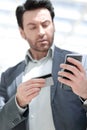 Close up.businessman dialing the number on the smartphone Royalty Free Stock Photo