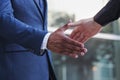 Businessman giving hand for handshake Royalty Free Stock Photo