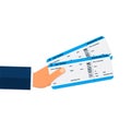 Close-up businessman hand holding air boarding tickets. Airline boarding tickets business class. Travel and business trips concept