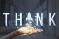 Close up of businessman hand holding creative text with space ship replacing letter on office interior background with