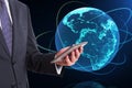 Close up of businessman hand holding smartphone with creative glowing globe hologram on dark background. Technology, metaverse and Royalty Free Stock Photo