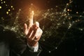 Close up of businessman hand pushing and using glowing polygonal mesh interface on background. Technology and network concept Royalty Free Stock Photo