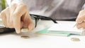 Businessman Hand Stacking Coins In Office, portable office concept