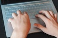 Close-up of businessman hand typing